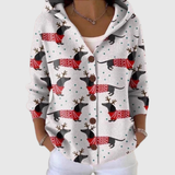 Alejandra | Chaqueta de punto con capucha y estampado navideño