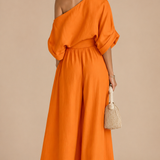 Lisa | Top sin hombros y pantalones ajustados