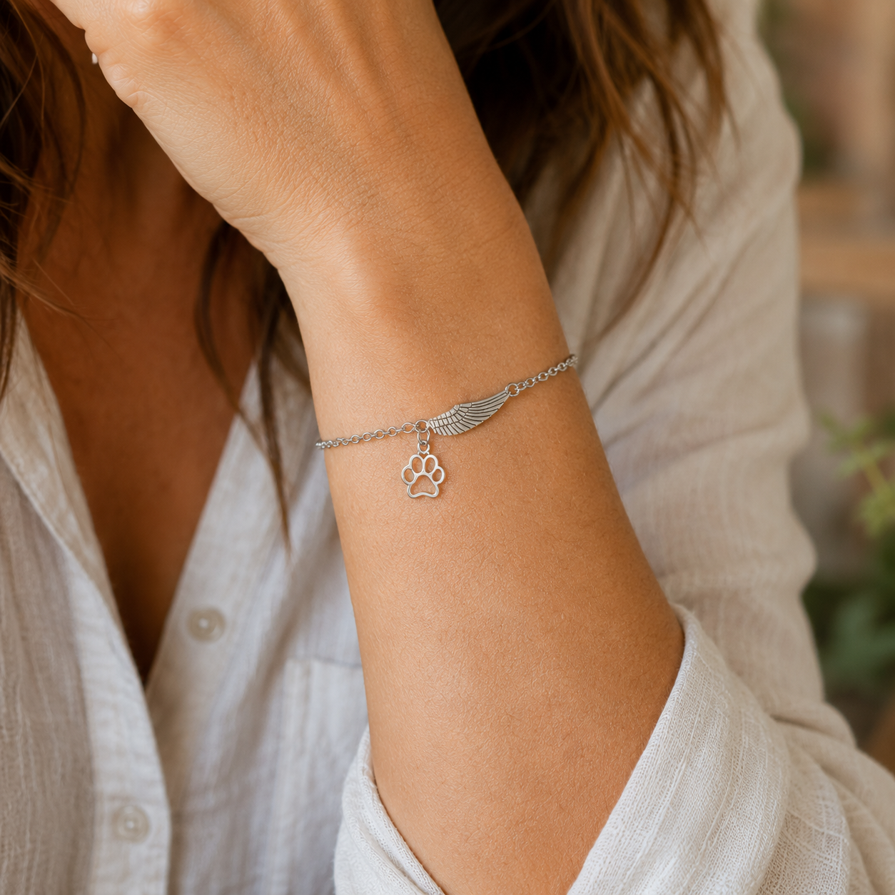 Rosalía | Pulsera con ala de ángel y huella de patita