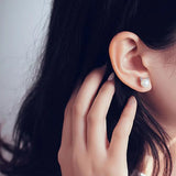 Sandra | Pendientes de perla con gato en plata