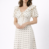 Georgina | Vestido midi de lunares con volantes