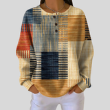 Marcela | Blusa de punto con estampado geométrico patchwork