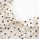 Georgina | Vestido midi de lunares con volantes