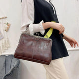 Bolso vintage con cierre de clic
